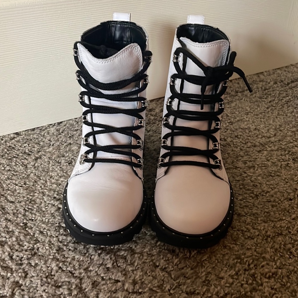 NWOT SOREL combat boots. Never worn. Cleaning out my closet. Make me an offer.